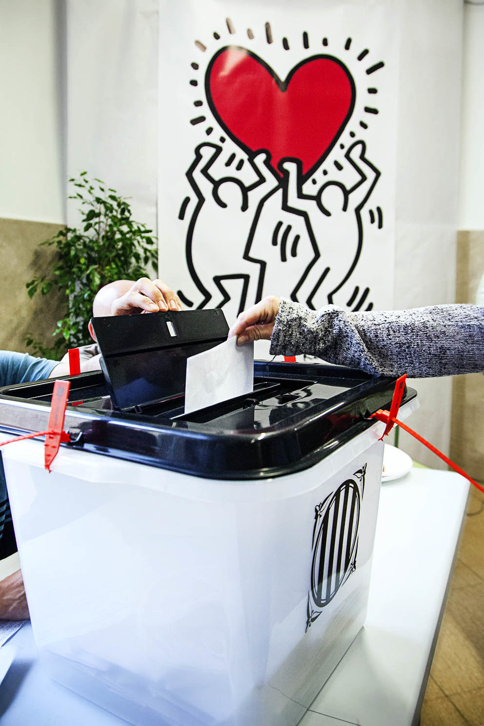 A woman votes excited in the referendum of self-determination of Catalonia